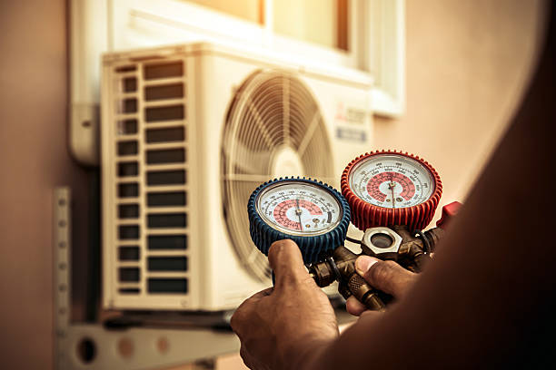 Professional Hvac technician working in University Park, MD